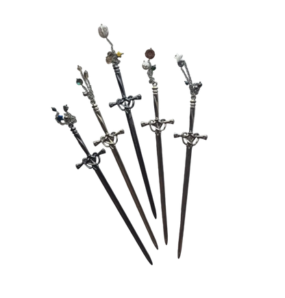Set of decorative swords with intricate designs on a white background