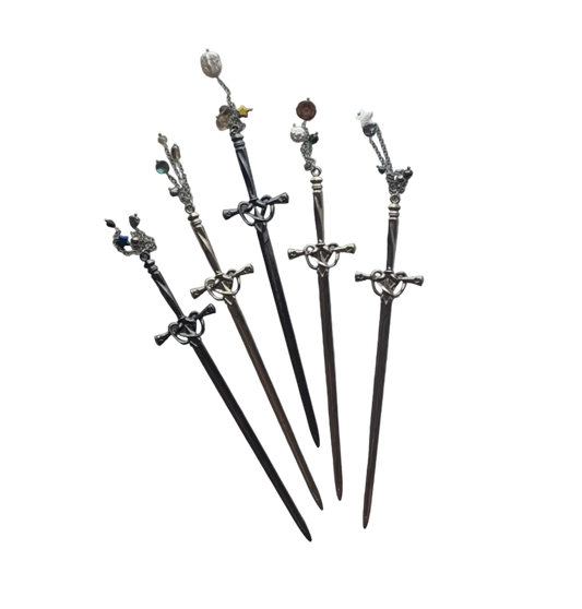 Set of decorative swords with intricate designs on a white background