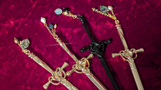 Set of decorative hair sticks on a red textured background